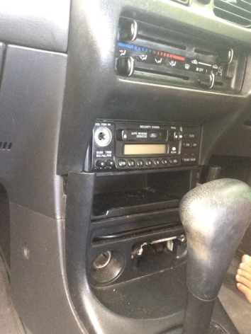 How to remove the original stereo out my ford laser 1998 model - 1