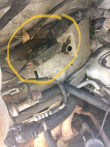 What part this is on a 2005 Ford Explorer across from the engine on the passenger side