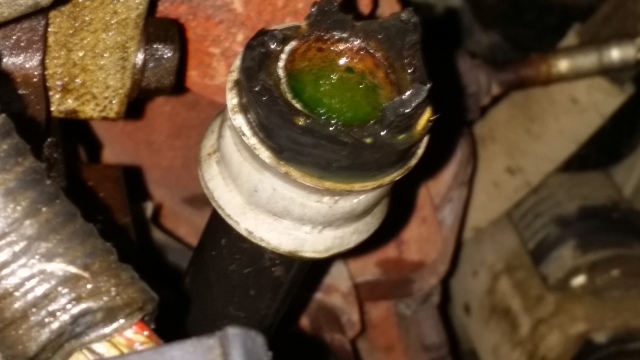 How to remove this clamp on coolant hose
