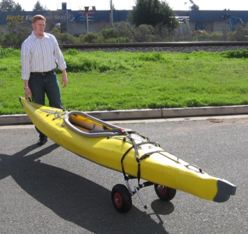 Is it possible to tow a canoe or kayak with a dolly cart