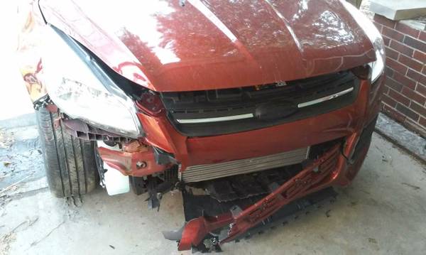 How much will it cost to repair a 2014 ford escape se frontal collision - 1